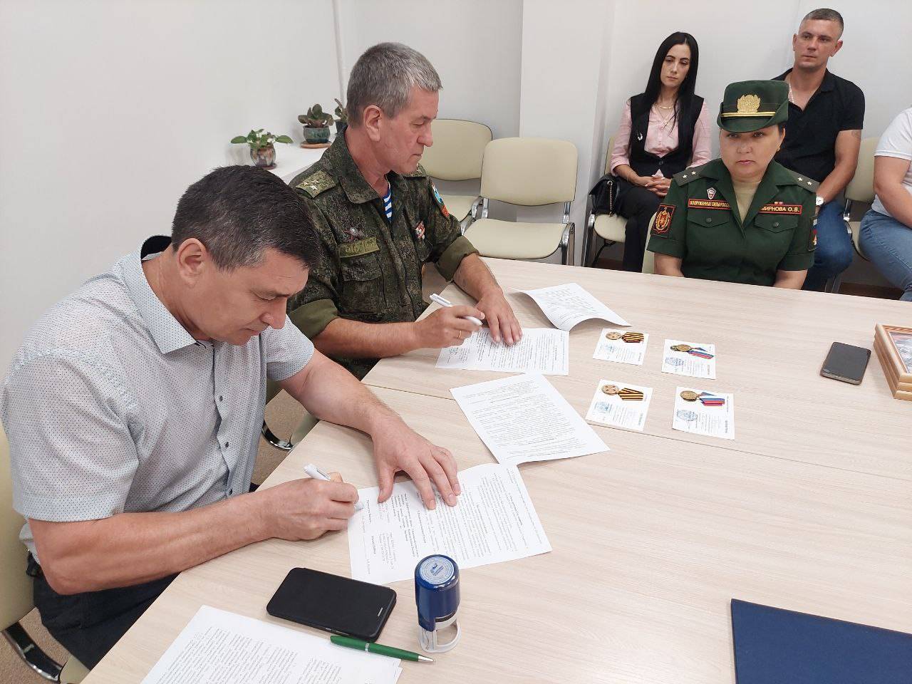 Соглашение о сотрудничестве и вручение знаков отличия и медалей